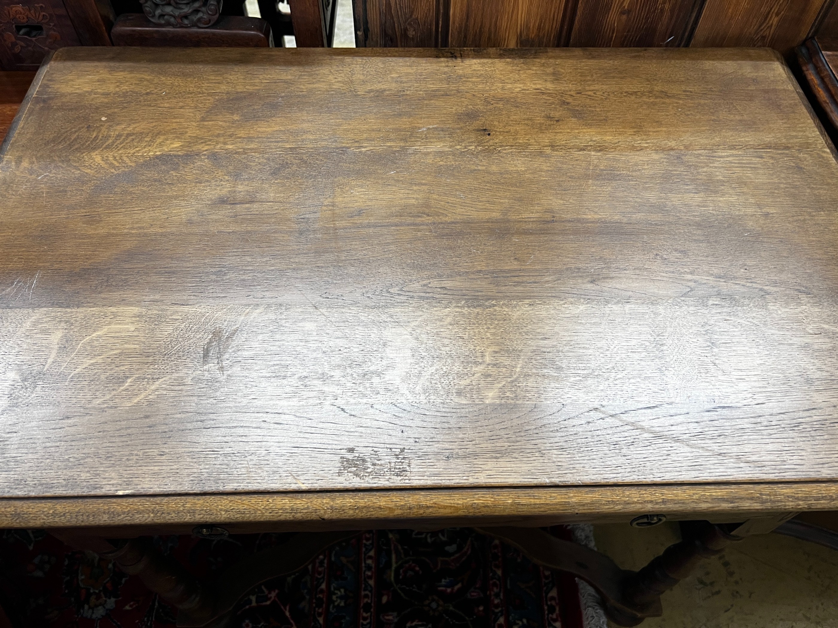 A small 1920's oak side table, width 84cm, depth 52cm, height 75cm